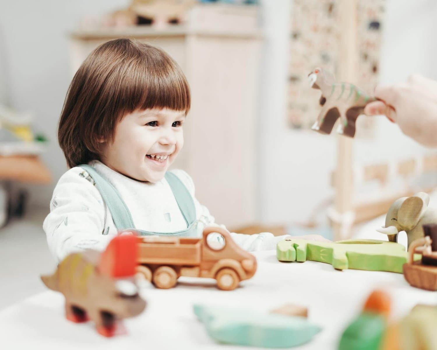 Speech therapist providing social skills therapy to a child in Fairfield County, Connecticut.